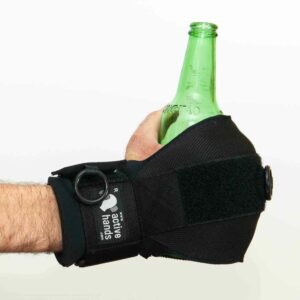 General Purpose gripping aid holding beer bottle. Adaptive gym equipment. Suitable for reduced hand function: tetra, quad, cerebral palsy, SCI, spinal cord injury, stroke and more. Also known as quad grips, hand grips, gripping assist, quad hand strap, adaptive grip.