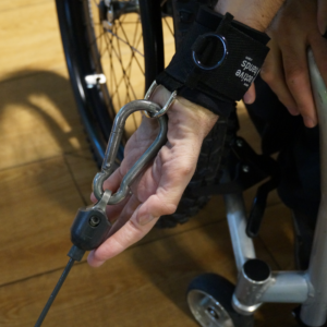 D-ring aid close-up Adaptive gym equipment. Suitable for reduced hand function: tetra, quad, cerebral palsy, SCI, spinal cord injury, stroke and more.