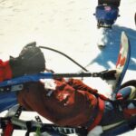 Winter sports gripping aid being used on sit ski. Suitable for reduced hand function: tetra, quad, cerebral palsy, SCI, spinal cord injury, stroke and more.