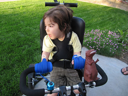 Mini aids being used to hold handlebars