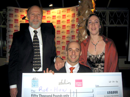 Rob, Mel and Trevor , our company directors, receive a big cheque