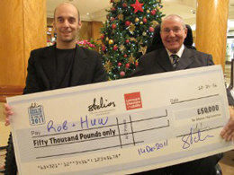 Rob receiving big cheque