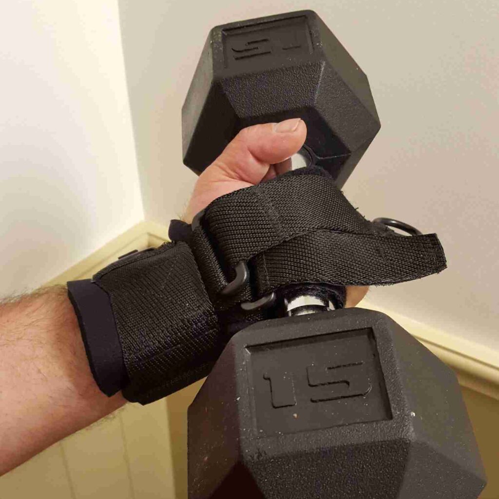 active hands limb difference aid being used to help person with limb difference hold and exercise with dumbbell