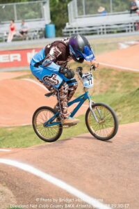 Daniel riding BMX with General Purpose aid.