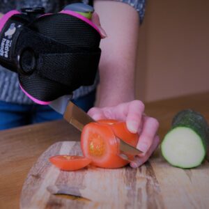 multi-purpose right-angle handled kitchen knife chopping salad. Suitable for reduced hand function: tetra, quad, cerebral palsy, SCI, spinal cord injury, stroke and more.