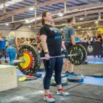 Tina weight lifting with Limb Difference aid