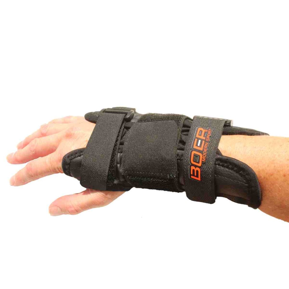 Wrist splint on hand. Suitable for reduced hand function: tetra, quad, cerebral palsy, SCI, spinal cord injury, stroke and more.