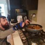 Gareth cooks with the small item aid