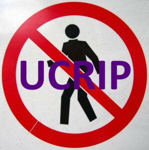 picture of a walking man with a red cross over it and the word "UCRIP"
