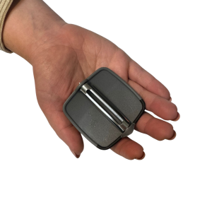 black grey palm peeler in hand