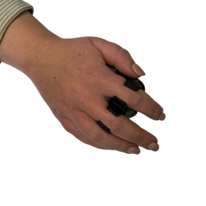 black grey palm peeler on hand