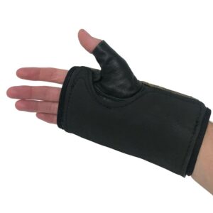 push glove on hand to help with wheelchair control designed for people with reduced hand function