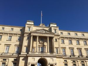 Buckingham Palace with clear blue skies behind it