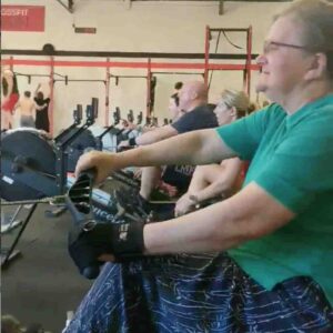 Norma uses a seated rower as part of her rehabilition