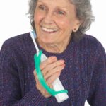 electric toothbrush in easy hold strap