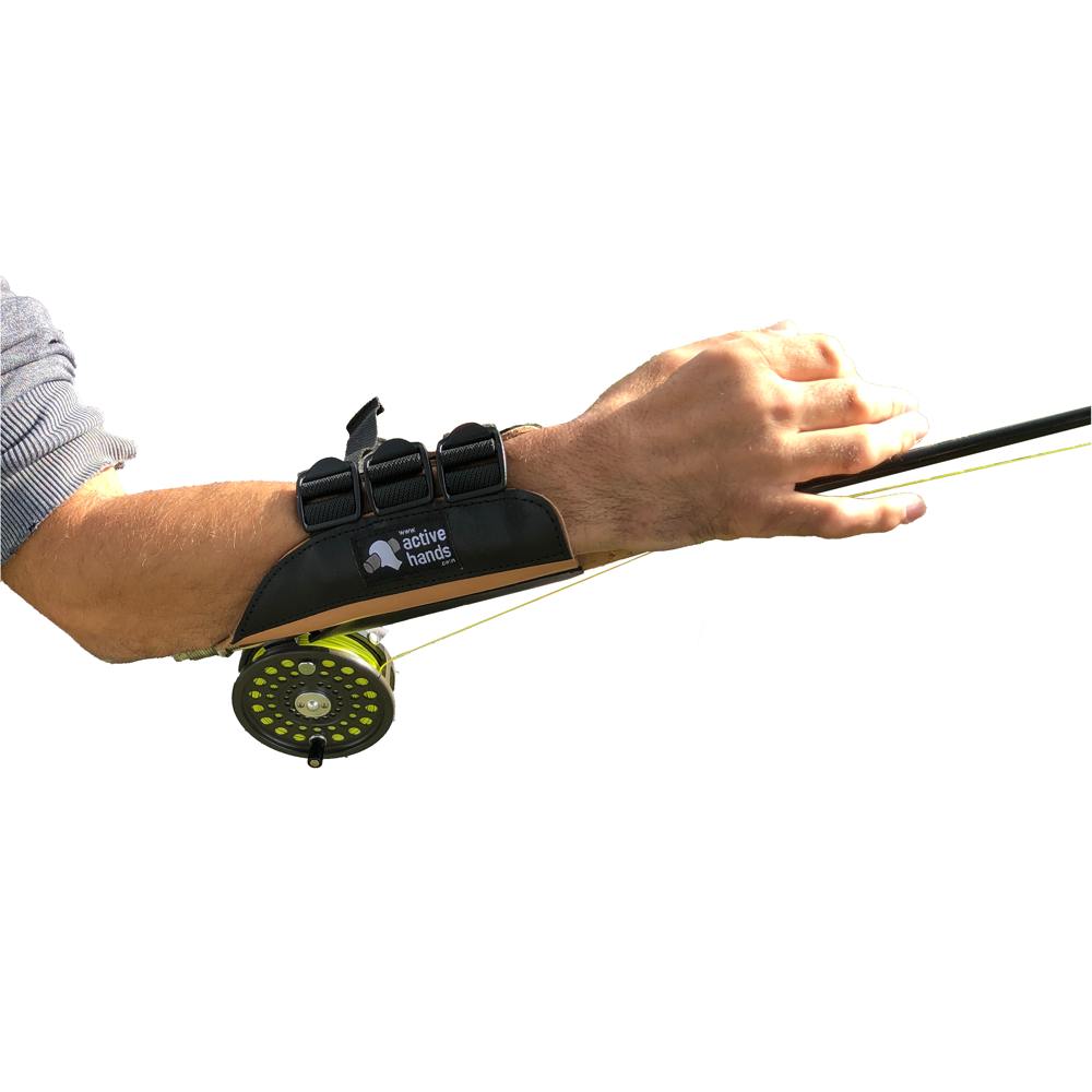 the strong arm 2 fishing aid on an arm showing how you can insert your fishing rod and hold it hands free