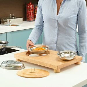 woman collecting food from the chopping board