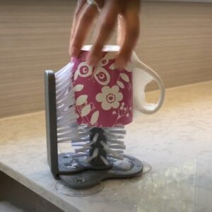 Jo shows you how the one-handed wash brush works