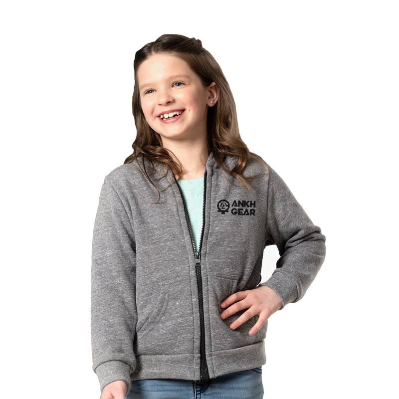 Child wears a grey hoodie with magnetic zip.