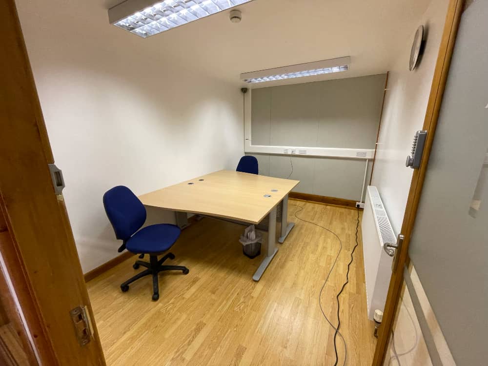 the new small meeting room with new desks