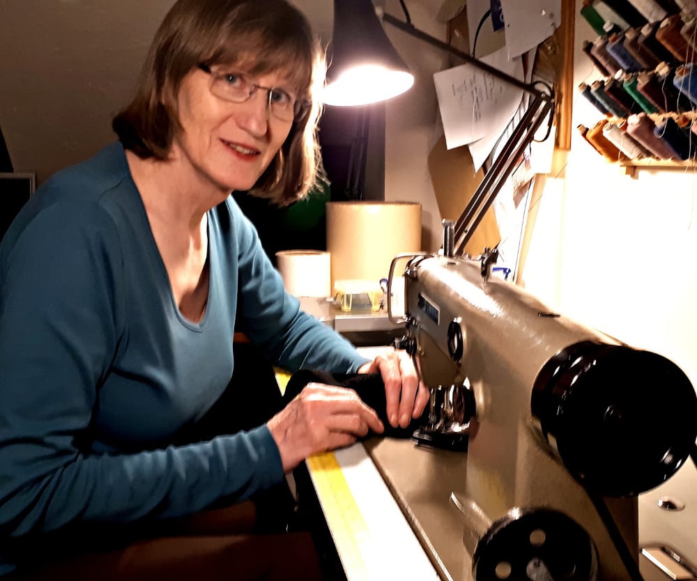 Shirley at her sewing machine making gripping aids