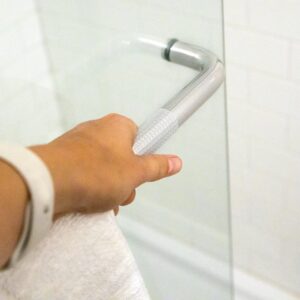 clear grip kit square patch stuck around a shower door handle