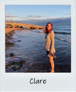 Clare is our marketing and technical manager. Here she is having an evening paddle on a beach