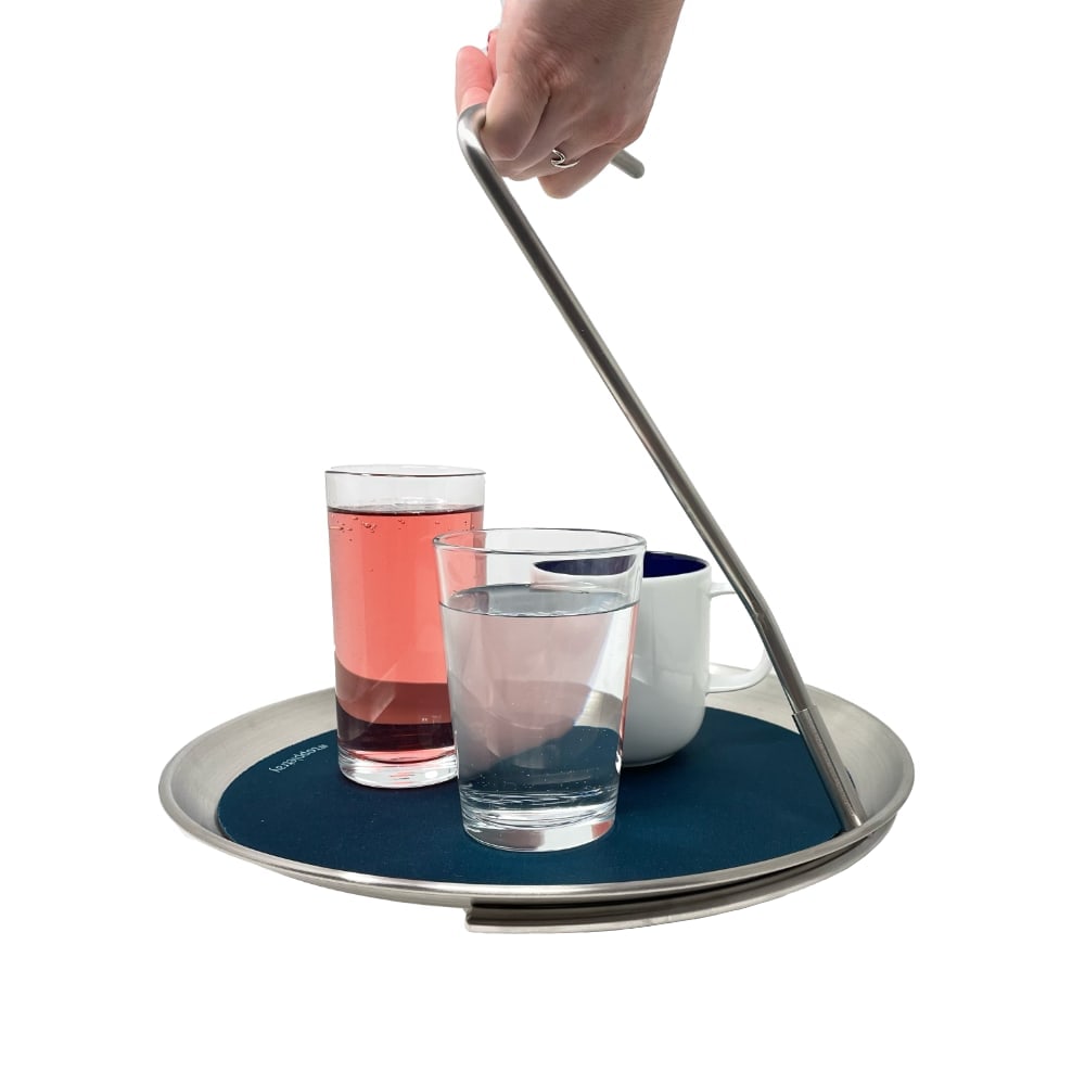 The topple tray lets you carry drinks and food with one hand