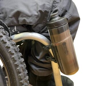 The Fidlock Twist bottle mounted on the frame of a wheelchair