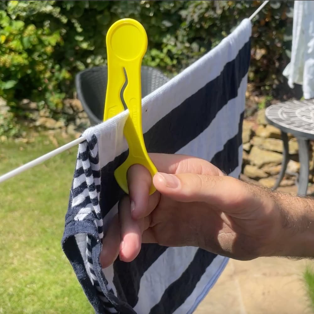 Rob talks through how the wiggly pegs work for hanging out washing. Easy to use by those with reduced hand function.