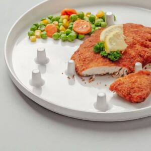 The one handed plate has pegs to hold your food in place while you cut it.