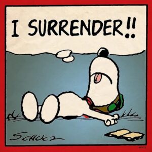 Cartoon of Snoopy lying on his back with a thought bubble saying 'I surrender'.