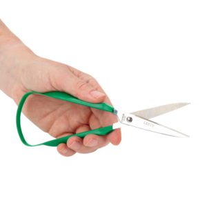 adult easi-grip left handed scissors which have a green handle, in a hand