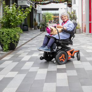 LapStacker XD on a powerchair holding shopping bags