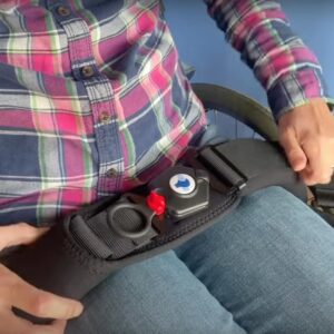 Rob and Clare demonstrate the Soloc wheelchair lap belts for those with reduced hand function