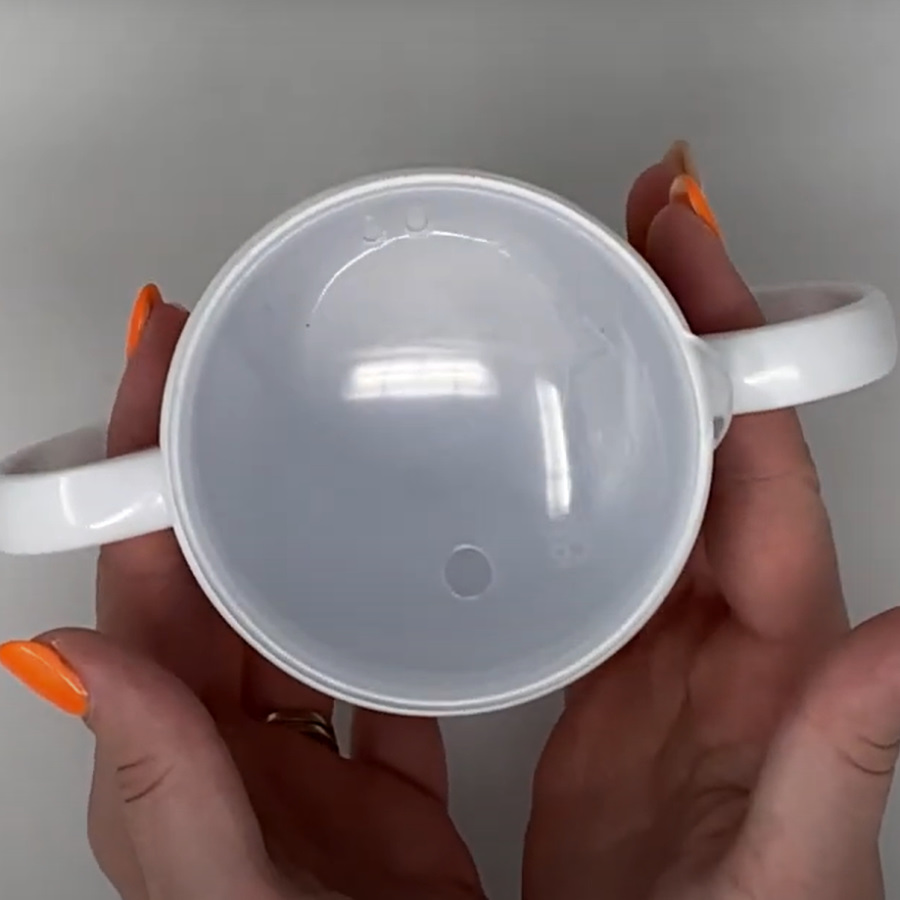 Two-Handled mug video with optional lid in use