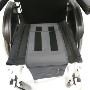 The wheelchair under-seat bag attaches under your seat cushion with two flaps that velcro in place