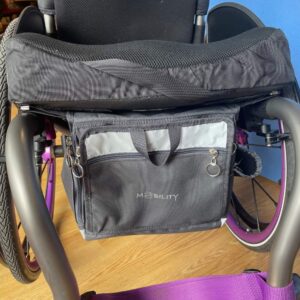 Showing how the wheelchair box fits under a fixed wheelchair seat