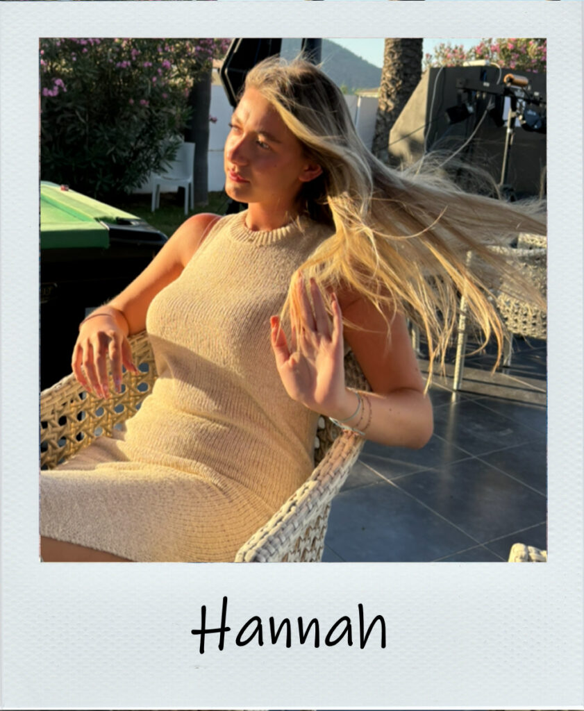 Hannah in a beige dress on holiday