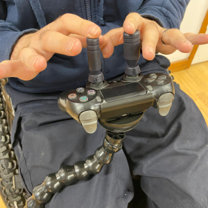 Gaming Controller grips on controller, held by the Flexi Phone Holder controller holder