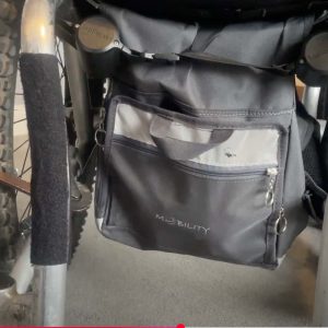 Image shows the wheelchair underseat bag in position under the seat of a wheelchair.