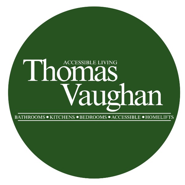 Image shows a green, circular logo with white text reading, accessible living, Thomas Vaughan