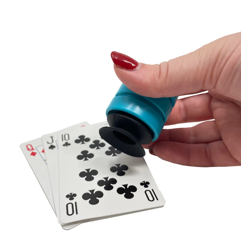 The Pick Up (P'KUP) device helps you to pick up playing card if your hand function prevents you from getting them off a flat surface