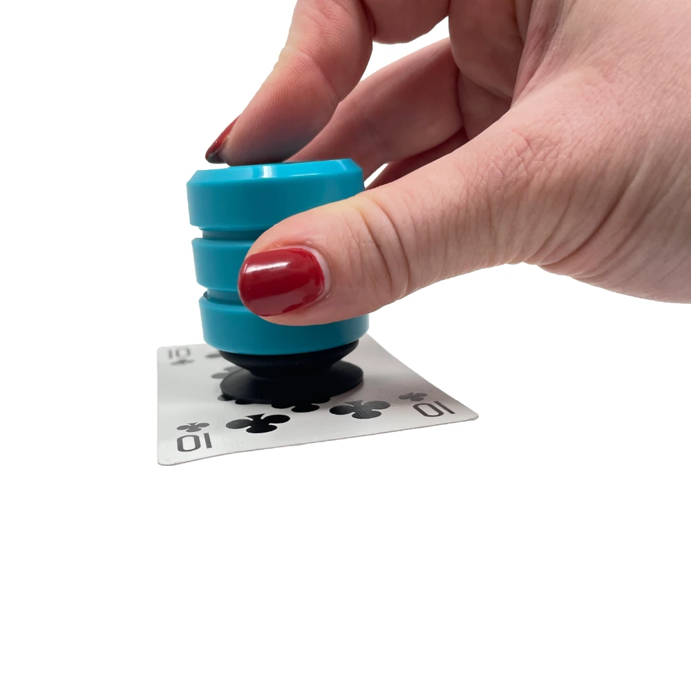Press the button on the top of the P'KUP to drop the card